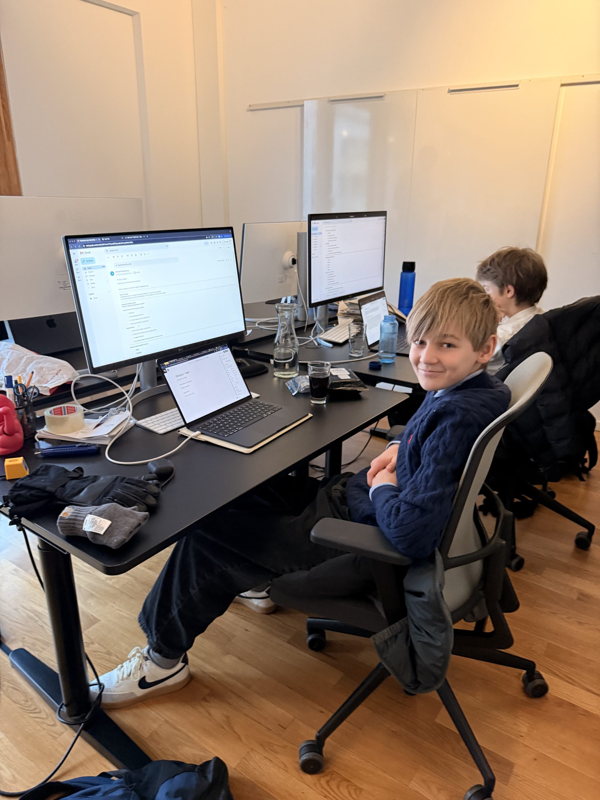 Hugo and Makar working at their computers